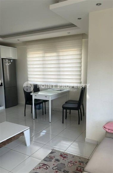 Просторная квартира 65 м² с застекленным балконом в Махмутларе, рядом с морем-id-8767-фото-3