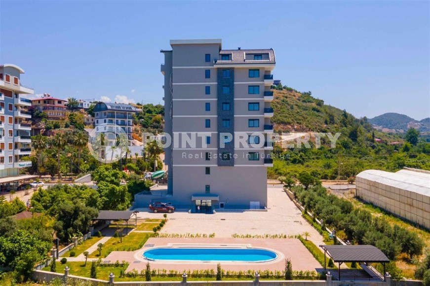 Современная квартира 1+1 с видом на горы в районе Демирташ-id-8784-фото-10