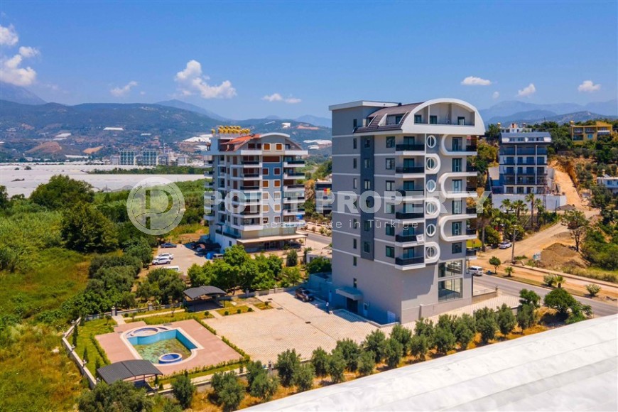 Современная квартира 1+1 с видом на горы в районе Демирташ-id-8784-фото-13