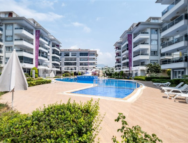 Ухоженная двухкомнатная квартира, 70м², в элитном комплексе в 250м от моря в Кестеле, Алания-id-1686-фото-2