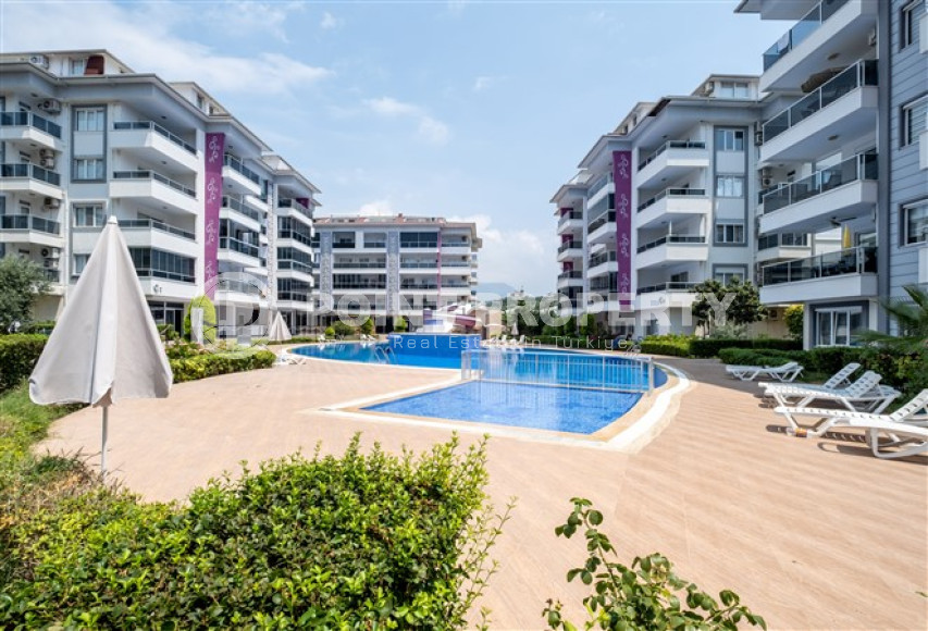 Ухоженная двухкомнатная квартира, 70м², в элитном комплексе в 250м от моря в Кестеле, Алания-id-1686-фото-2