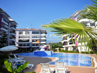 Ухоженная двухкомнатная квартира, 70м², в элитном комплексе в 250м от моря в Кестеле, Алания-id-1686-фото-4