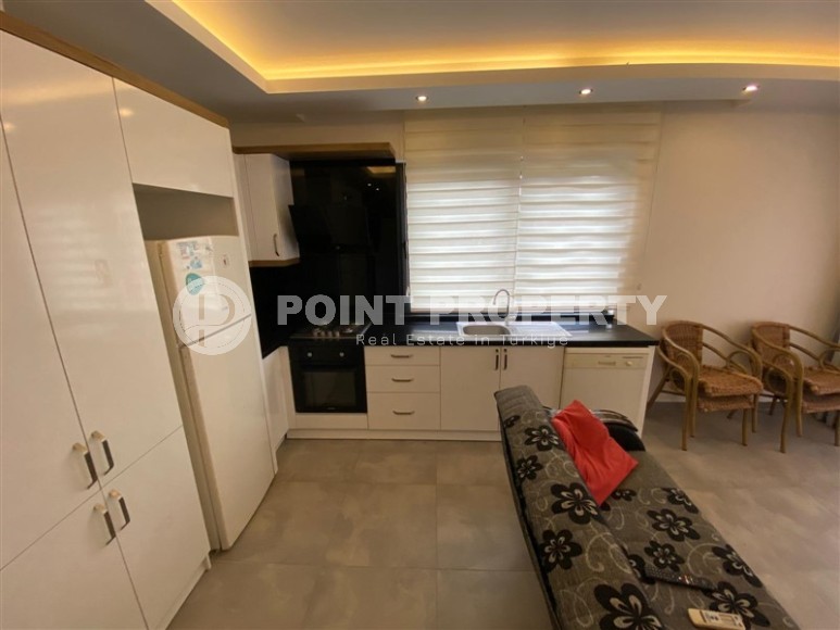 Современная квартира 50 м² в популярном районе Махмутлар-id-8793-фото-2