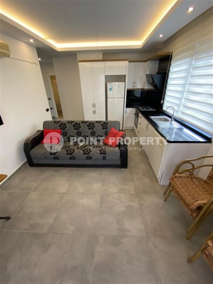 Современная квартира 50 м² в популярном районе Махмутлар-id-8793-фото-3