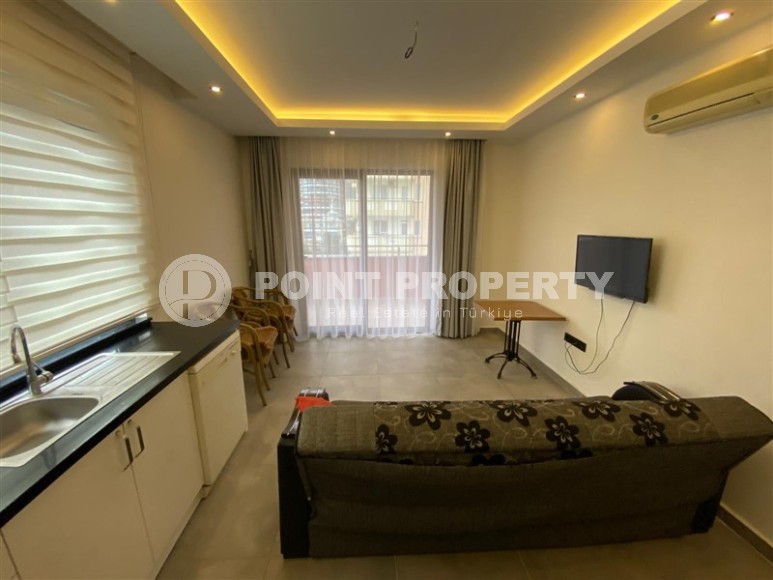 Современная квартира 50 м² в популярном районе Махмутлар-id-8793-фото-4