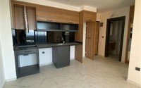 Современная квартира 50 м² в новом комплексе в Махмутларе-id-8795-фото-2