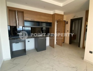 Современная квартира 50 м² в новом комплексе в Махмутларе-id-8795-фото-2