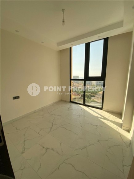 Современная квартира 50 м² в новом комплексе в Махмутларе-id-8795-фото-3