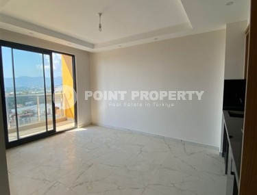 Современная квартира 50 м² в новом комплексе в Махмутларе-id-8795-фото-4