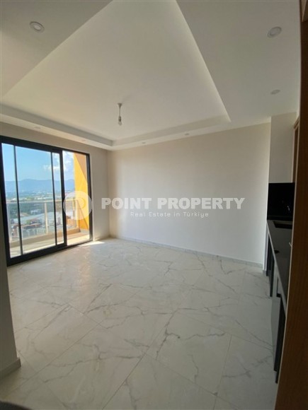 Современная квартира 50 м² в новом комплексе в Махмутларе-id-8795-фото-4