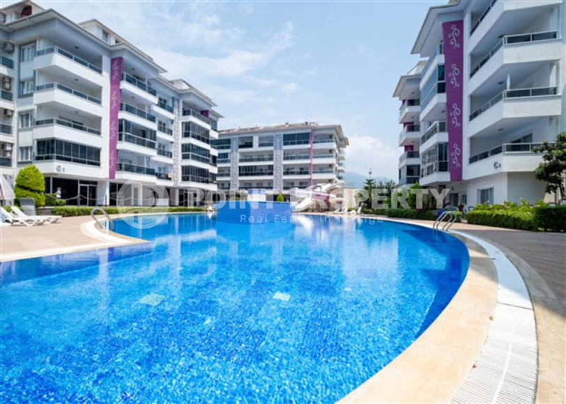 Ухоженная двухкомнатная квартира, 70м², в элитном комплексе в 250м от моря в Кестеле, Алания-id-1686-фото-18