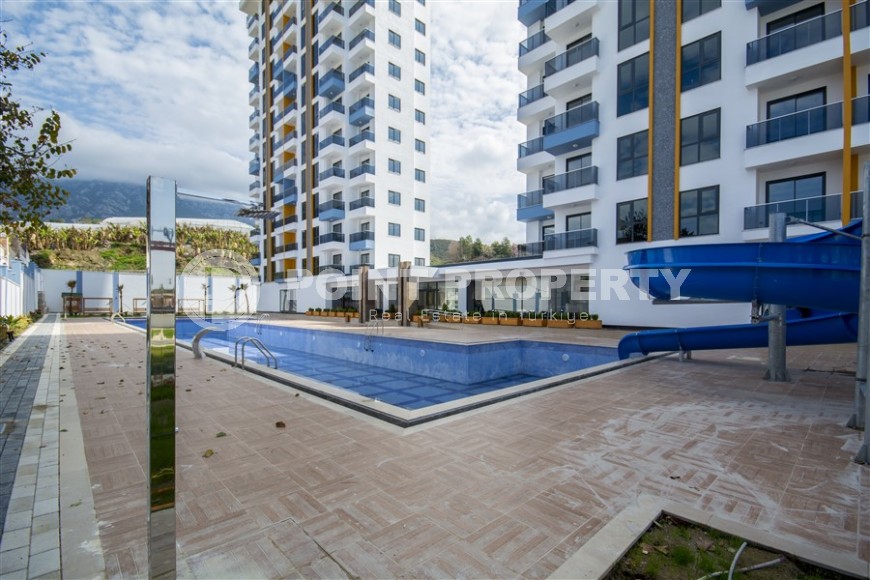 Современная квартира 50 м² в новом комплексе в Махмутларе-id-8795-фото-13