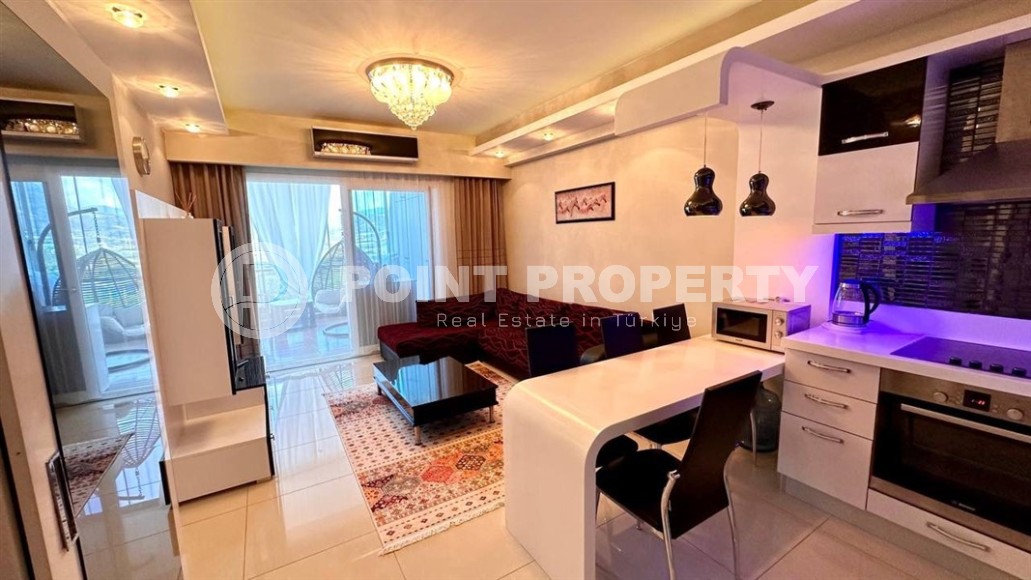 Apartment 60 m² in a prestigious hotel-type complex in Mahmutlar-id-8799-photo-2