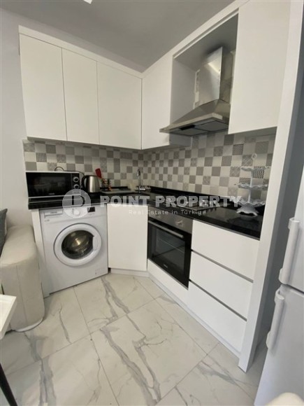 Современная квартира 1+1 в Махмутларе, в 400 метрах от пляжа-id-8800-фото-5