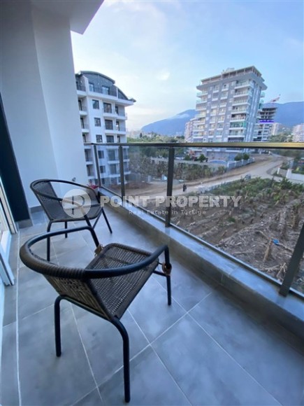 Современная квартира 1+1 в Махмутларе, в 400 метрах от пляжа-id-8800-фото-9