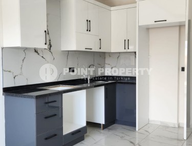 Современная квартира 55 м² в районе Демирташ-id-8830-фото-3