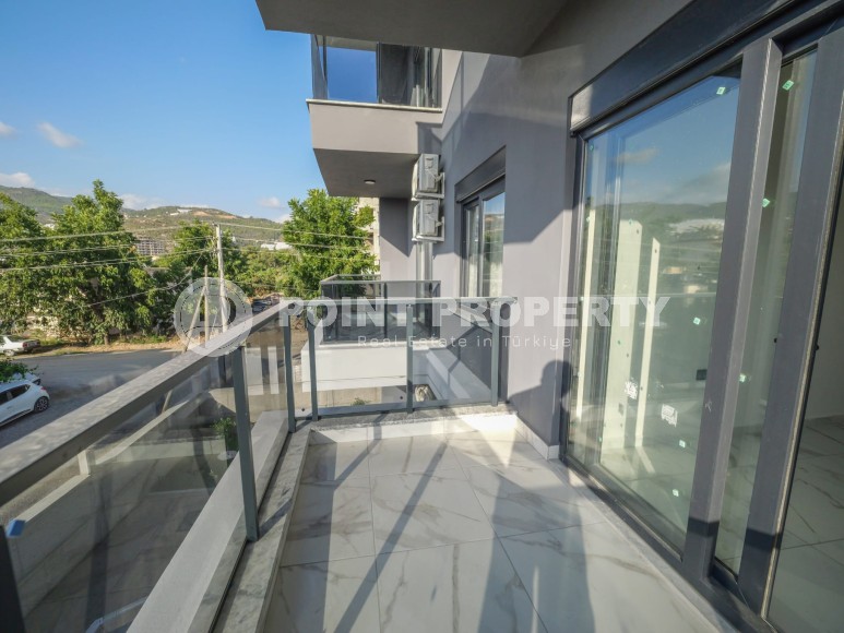 Современная квартира 55 м² в районе Демирташ-id-8830-фото-6