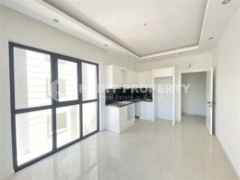 Современная квартира 55 м² в новом комплексе в Махмутларе-id-8838-фото-2