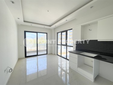 Современная квартира 55 м² в новом комплексе в Махмутларе-id-8838-фото-3