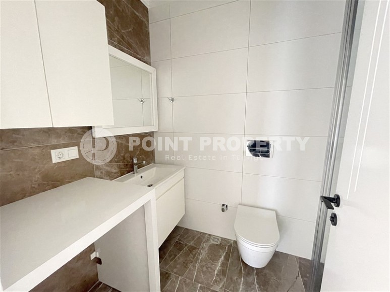 Современная квартира 55 м² в новом комплексе в Махмутларе-id-8838-фото-6