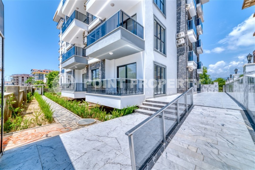 Современная квартира 55 м² в новом комплексе в Махмутларе-id-8838-фото-16