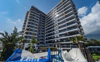 Просторная квартира 95 м² с видом на море в Махмутларе-id-8842-фото-1