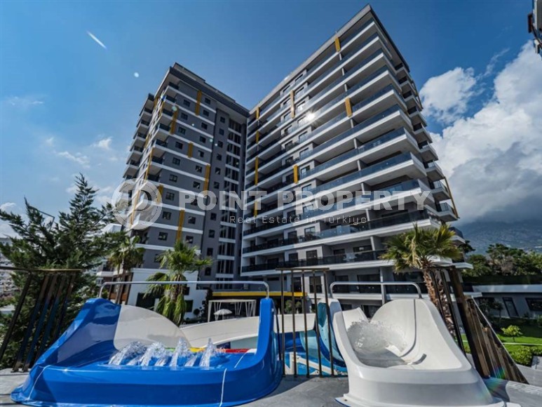 Просторная квартира 95 м² с видом на море в Махмутларе-id-8842-фото-1