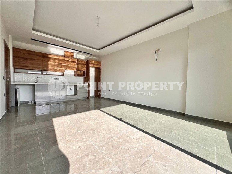 Spacious apartment 95 m² with sea view in Mahmutlar-id-8842-photo-3