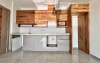 Просторная квартира 95 м² с видом на море в Махмутларе-id-8842-фото-4