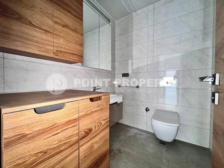 Spacious apartment 95 m² with sea view in Mahmutlar-id-8842-photo-9