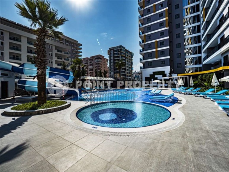 Spacious apartment 95 m² with sea view in Mahmutlar-id-8842-photo-19