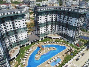 Spacious 1+1 apartment 55 m² with modern infrastructure in the center of Mahmutlar-id-8853-photo-1