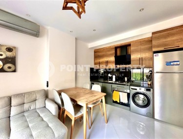 Просторная 1+1 квартира 55 м² с современной инфраструктурой в центре Махмутлара-id-8853-фото-2