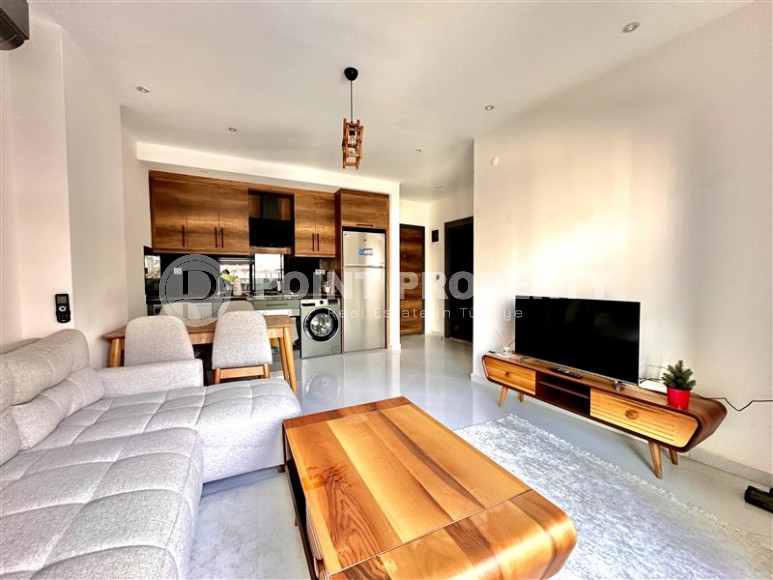 Просторная 1+1 квартира 55 м² с современной инфраструктурой в центре Махмутлара-id-8853-фото-3