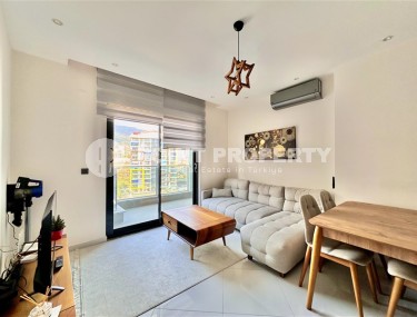 Просторная 1+1 квартира 55 м² с современной инфраструктурой в центре Махмутлара-id-8853-фото-4