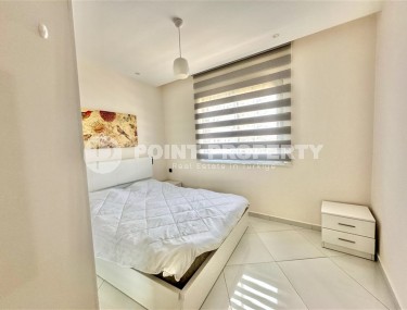 Просторная 1+1 квартира 55 м² с современной инфраструктурой в центре Махмутлара-id-8853-фото-5