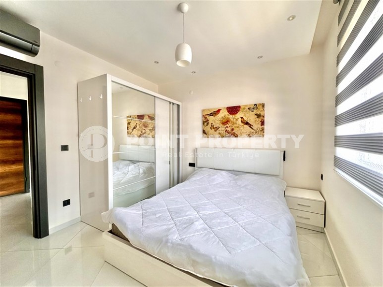 Просторная 1+1 квартира 55 м² с современной инфраструктурой в центре Махмутлара-id-8853-фото-6