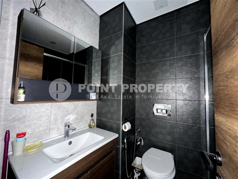 Просторная 1+1 квартира 55 м² с современной инфраструктурой в центре Махмутлара-id-8853-фото-7