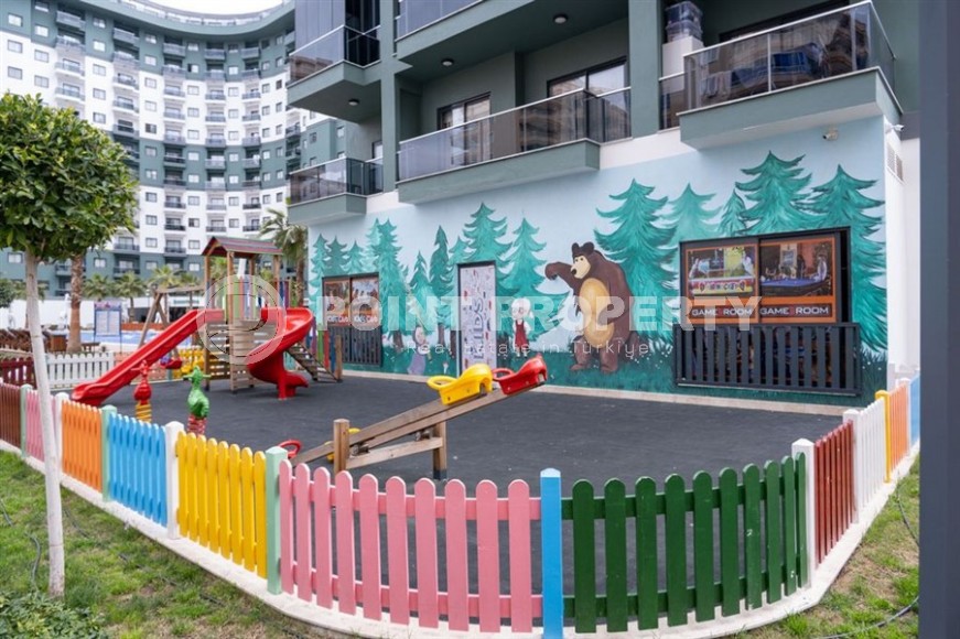 Просторная 1+1 квартира 55 м² с современной инфраструктурой в центре Махмутлара-id-8853-фото-16