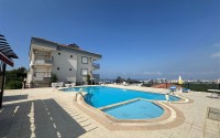 Spacious apartment 100 m² with sea view in a low-rise building in Kargicak-id-8860-photo-1