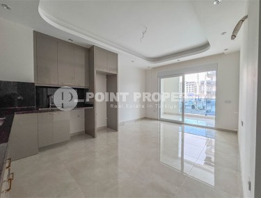 Квартира 58 м² в престижном комплексе в Махмутларе-id-8874-фото-2