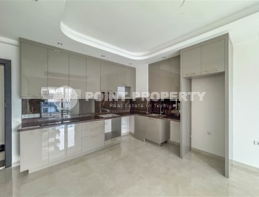 Квартира 58 м² в престижном комплексе в Махмутларе-id-8874-фото-3