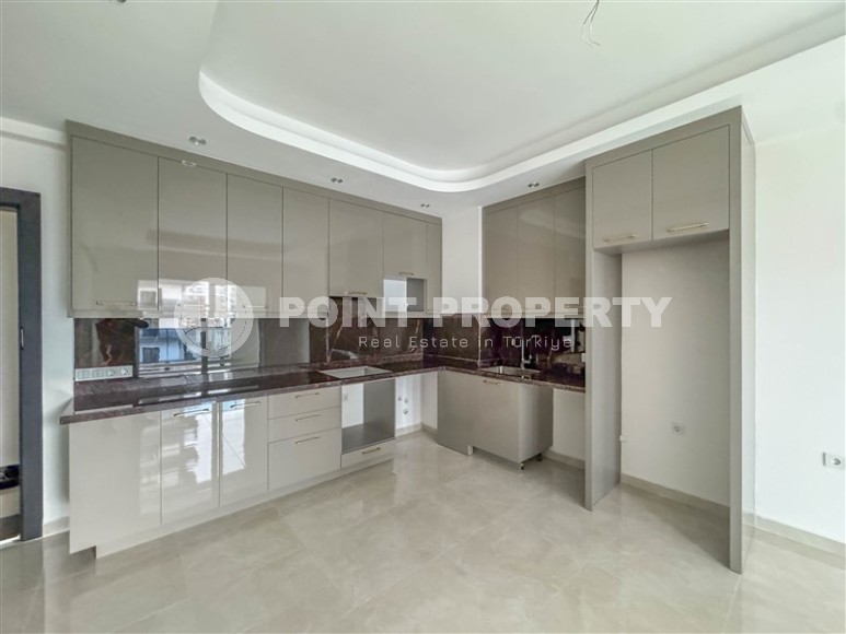 Квартира 58 м² в престижном комплексе в Махмутларе-id-8874-фото-3