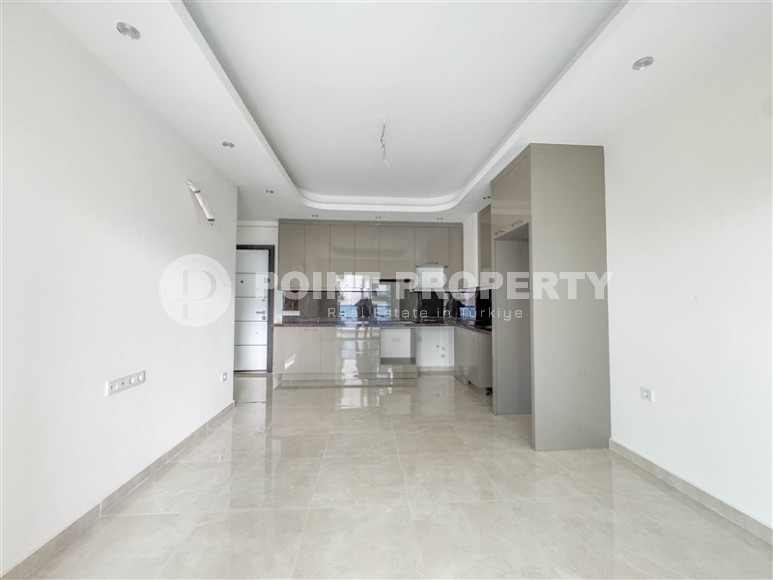 Квартира 58 м² в престижном комплексе в Махмутларе-id-8874-фото-4