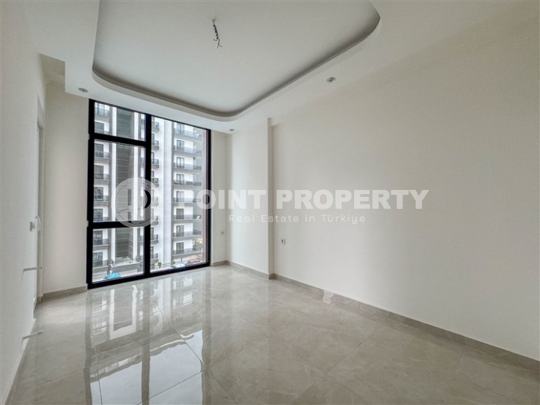 Квартира 58 м² в престижном комплексе в Махмутларе-id-8874-фото-5