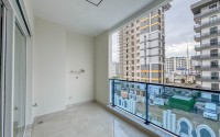 Квартира 58 м² в престижном комплексе в Махмутларе-id-8874-фото-7