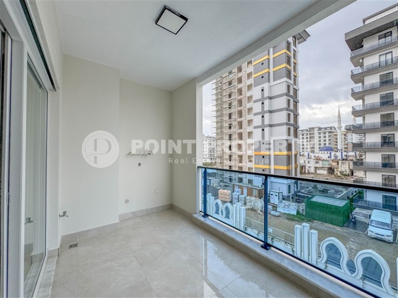 Квартира 58 м² в престижном комплексе в Махмутларе-id-8874-фото-7