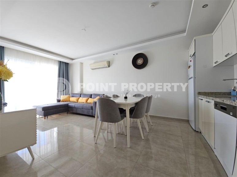 Уютная квартира 65 м² с балконом и богатой инфраструктурой в Махмутларе-id-8907-фото-3