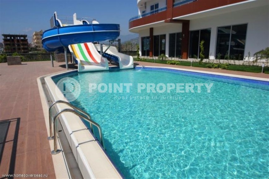 Уютная квартира 65 м² с балконом и богатой инфраструктурой в Махмутларе-id-8907-фото-18