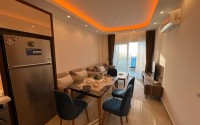 Современная квартира 70 м² с видом на море в районе Махмутлар-id-8908-фото-3